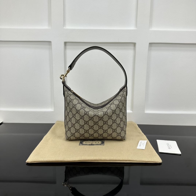 G*u*i top handle bags